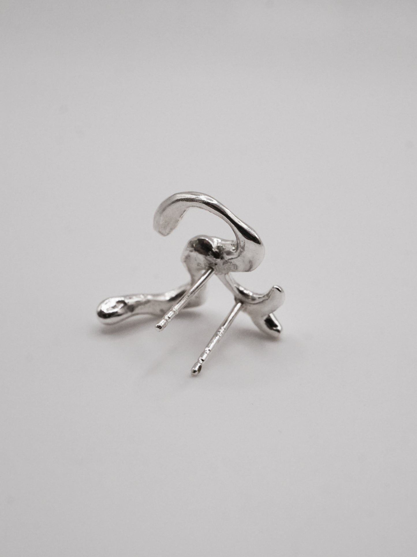 DG001 earring for two side by side piercings